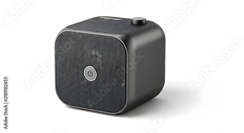 Obraz na płótnie Compact cubic wireless speaker with control buttons and textured panel placed on white backdrop.
