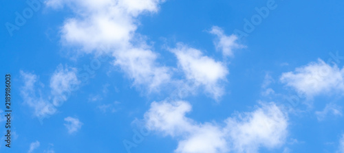Fotografie Low angle view and full frame of beautiful blue sky with strange shape of thin f