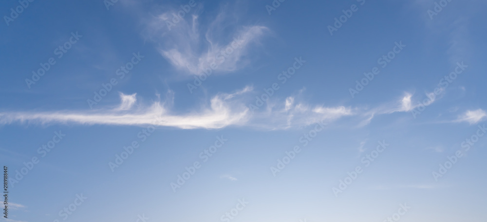 Fototapeta premium Beautiful morning or evening blue and orange sky with cloudy while sunsets or sunrises taken at the sea used as natural background texture