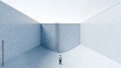 Картината върху платно Man standing alone in large empty swimming pool looking at ladder as only exit,