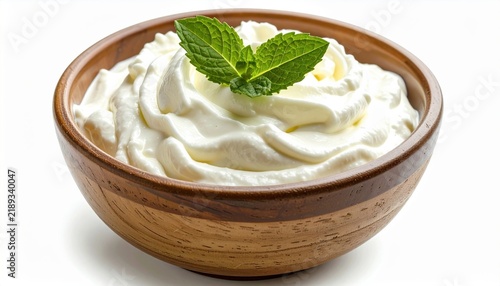 Bowl of creamy Greek yogurt, isolated on white