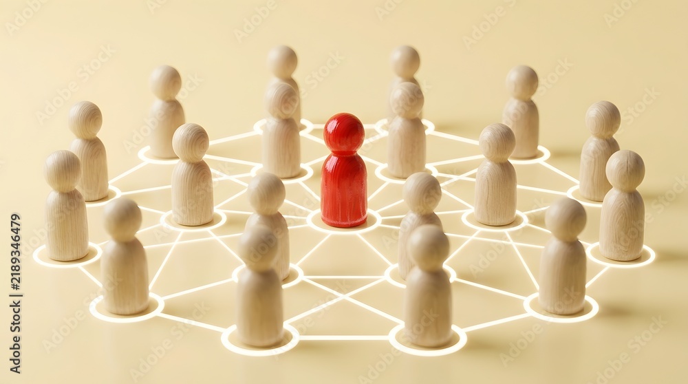 Obraz premium Sophisticated corporate leadership concept with a central red wooden figure connected to a network of natural wooden peg dolls on a beige background, symbolizing teamwork and connectivity.