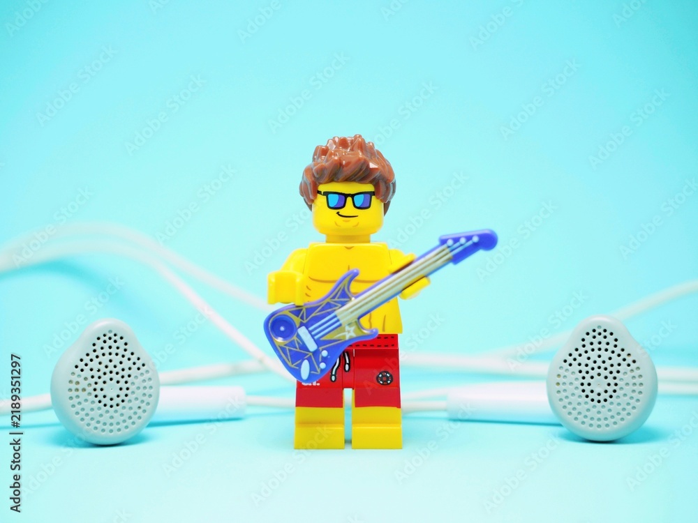 Fototapeta premium Indonesia - September 8, 2023 : Mini toy of action figure at table with blurred background. Miniature photography concept design.