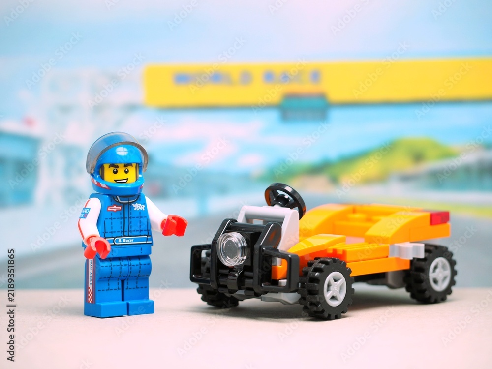 Obraz premium Indonesia - August 16, 2023 : Mini toy at table with blurred background. Racing car concept design.