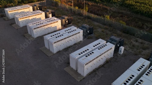 BESS Units at an Industrial Site During Late Afternoon