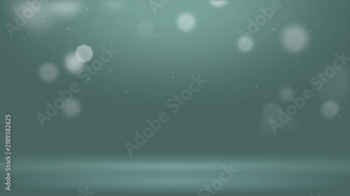 Seamless Animation of Soft Glowing Particles Slowly Flying against a Cyan Dackground