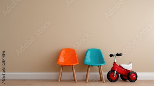 Colorful children's chairs and a tricycle against a beige wall