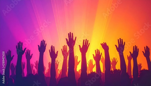 Silhouettes of raised hands enjoying a music concert and festival.