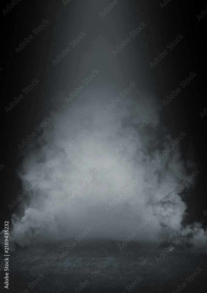Obraz premium Thick white smoke rising against a dark background, creating a mysterious atmosphere.