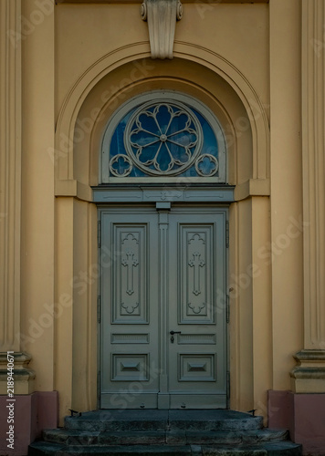 Canvastavla Historic church entrance with ornate wooden doors in Neuruppin, Brandenburg, Ger