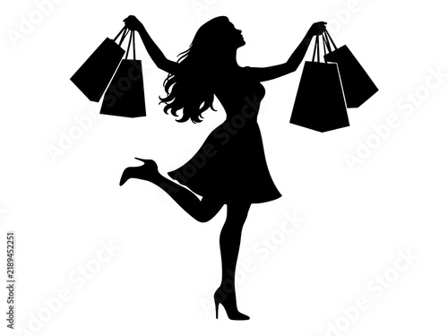 Confident woman holding shopping bags celebrating successful retail purchase with dynamic pose