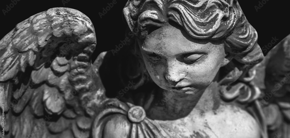 Fototapeta premium Angel of Death with lowered eyes, symbolic image of the final farewell and the journey to the afterlife.