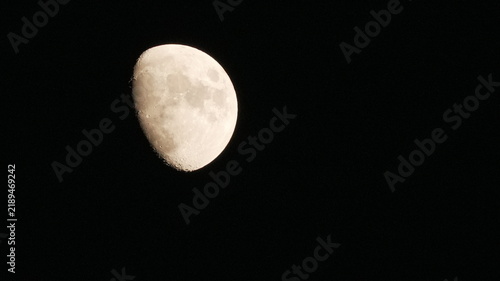 Cuadro en lienzo Detailed waxing gibbous moon with visible craters and surface texture isolated o