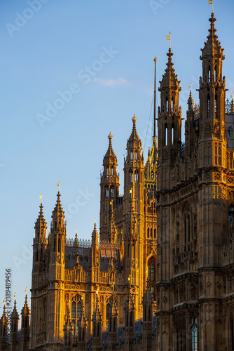 Sunset glow scenery of the Houses of Parliament building in London, England.