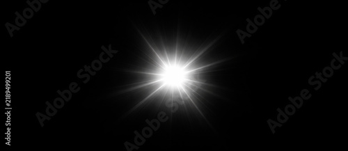 Bild auf Leinwand Brilliant white starburst flare with intense radial rays and radiant central glo