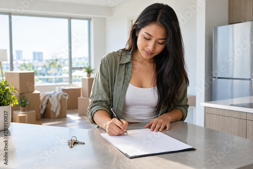 Renter signing apartment lease