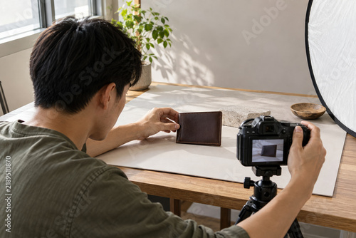 Freelancer photographing handmade product