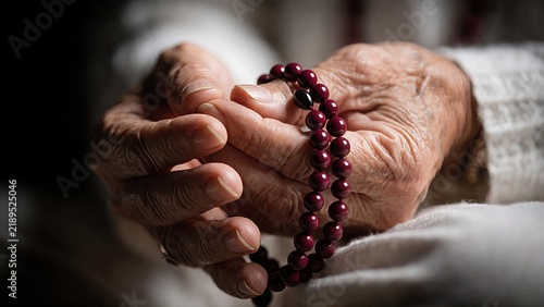 Elderly Hands Holding Prayer Beads In Bed.
