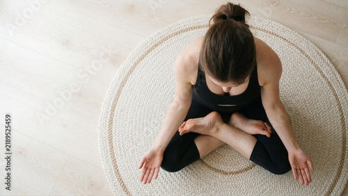 Top View Woman Meditating In Yoga Circle.
