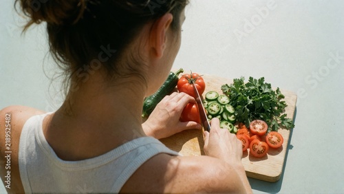 Woman Holding Fresh Produce Basket.