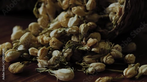 Dried jasmine flowers prepared as a natural ingredient for brewing fragrant jasmine flower tea.