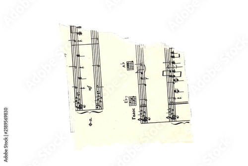 Scrap of old torn music sheet, vintage yellowed ripped paper with notes isolated for design. Transparent background. Vintage musical notation fragment for scrapbooking, collage art, journaling