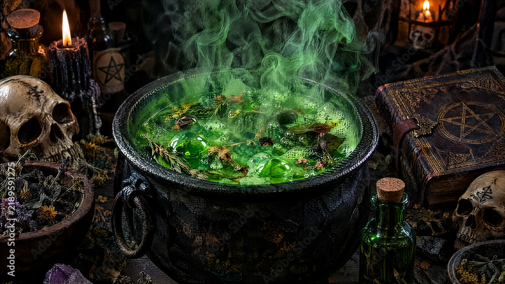 Fototapeta premium Dark fantasy witch's cauldron bubbling with green potion and smoke, surrounded by occult objects, skull, spellbook, and candles on a wooden table, mystical Halloween scene