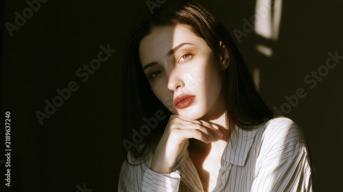 Cinematic film grain texture with soft light leaks, vintage analog photograph...