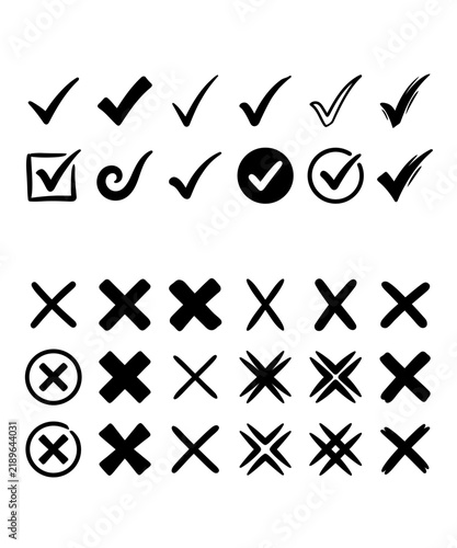 Set of hand drawn check marks and cross signs isolated on white background for design elements