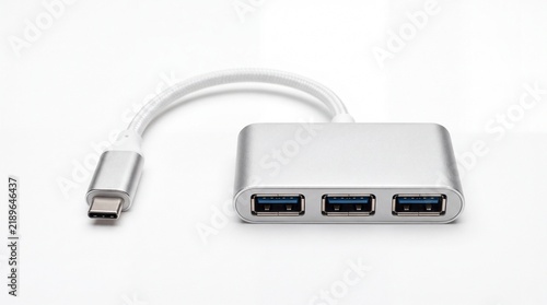 Metallic usb type c hub with multiple ports for data transfer displayed on white background