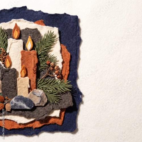 Decorative winter solstice altar with candles and natural elements  