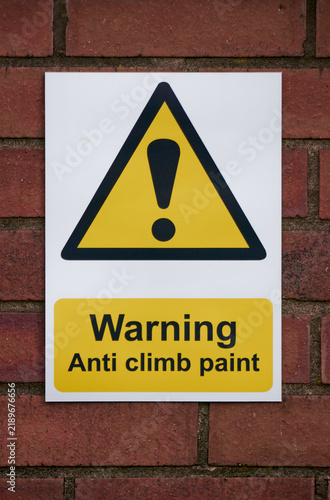 Sign, warning anti climb paint, warning triangle, yellow, black and white