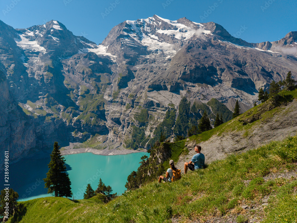 Obraz premium Breathtaking views at Oeschinensee in Kandersteg, Switzerland during a sunny holiday