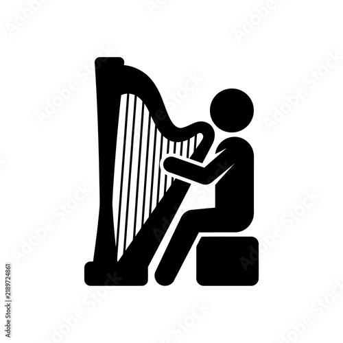 Bild auf Leinwand Musician playing harp with seated figure, black silhouette on transparent background