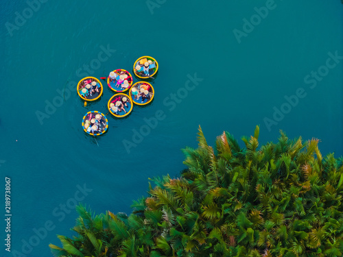 Aerial view of tourists in round boats on thu bon river, hoi an, vietnam