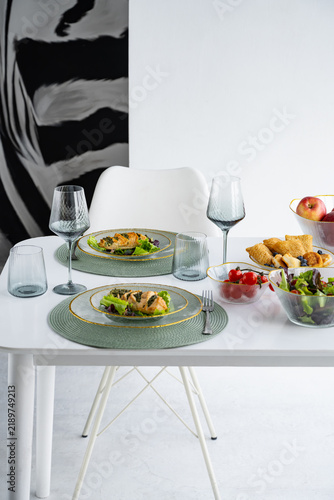 Dining Table Set for Two with Food in Dining Room
