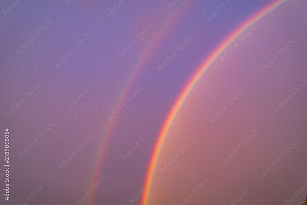 Fotografie double rainbow across purple sky
