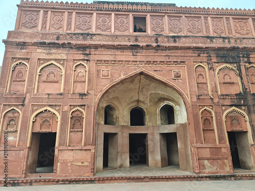 Canvastavla Ornate sandstone courtyard facade at Agra Fort India
