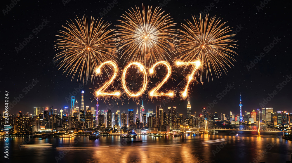 Obraz premium Sparkling 2027 New Year Fireworks Over Modern Illuminated City Skyline at Night