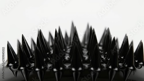 Spiky Black Ferrofluid Magnetic Liquid Reacting to Magnet