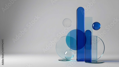 Clean grey background featuring futuristic transparent blue acrylic sphere art