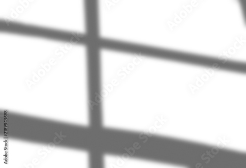 Картината върху платно Window pane shadow overlay diagonal geometric frame sunlight light minimalist in