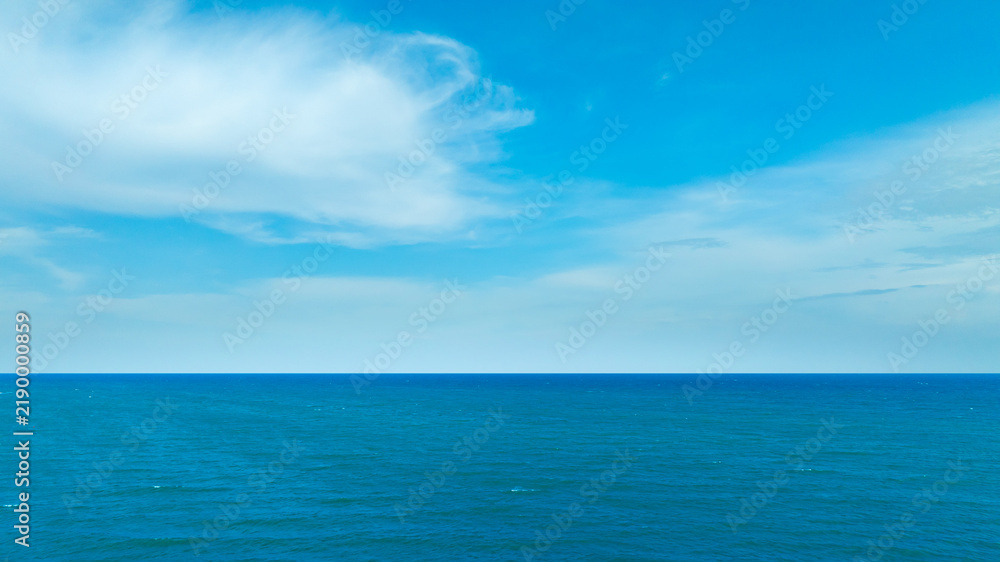 Fototapeta premium Tropical Nature ocean and summer sea water with beautiful bright sunlight. Perfect for summer vacation and travel background 