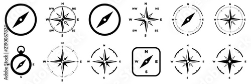 Collection of black and white compass and wind rose symbols for navigation and direction