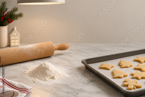 Rolling pin and cookie dough on marble counter, holiday christmas bakery baking concept
