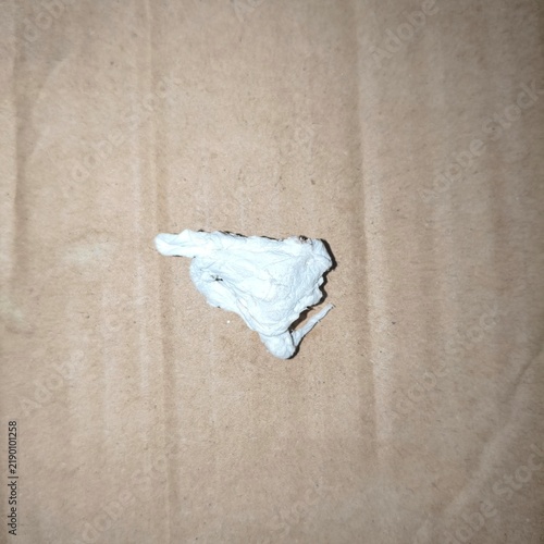 Konstfotografi A photo of a used, discarded tissue lying on cardboard scraps