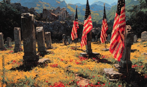 American flags placed at gravestones in a cemetery surrounded by vibrant wildflowers and mountains under a clear blue sky, symbolizing remembrance and honor