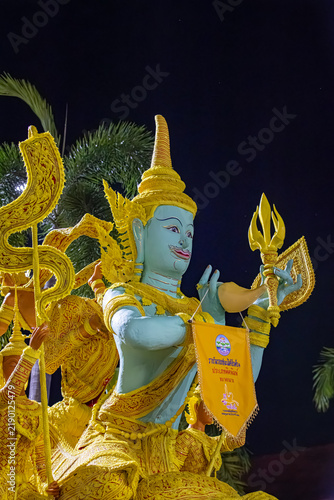 Buddhist Lent tradition, a beautiful display of wisdom, beeswax candles create art as a Buddhist offering.Background with Thai pattern carved on the surface of Lent candle.Ubon Ratchathani.Festival