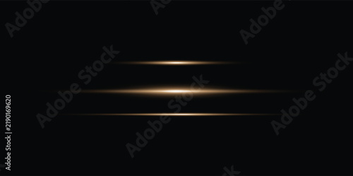 Three golden horizontal lens flares creating a beam effect on a black background