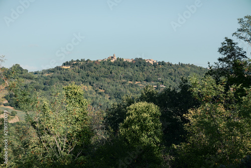 Obraz na płótnie View of Mondaino perched on a wooded hill in the Rimini province of Emilia Romag